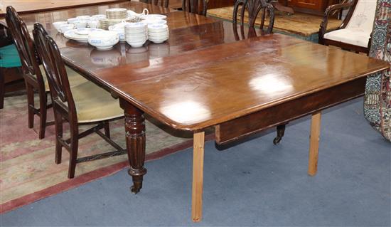 A Victorian mahogany extending dining table Length 305cm
